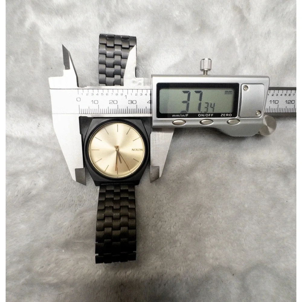 Nixon Minimalist Time Teller Mens 37mm Watch Matte Black Case & Gold Dial